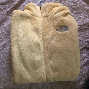 Women’s large soft yellow north face zip up.